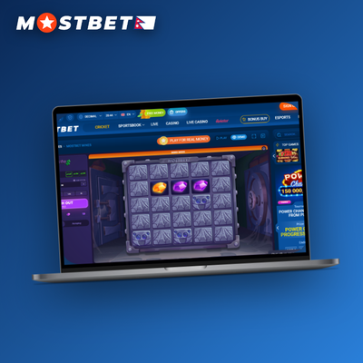 Mostbet Mines medium-risk tile with four mines marked and an amber gem multiplier badge